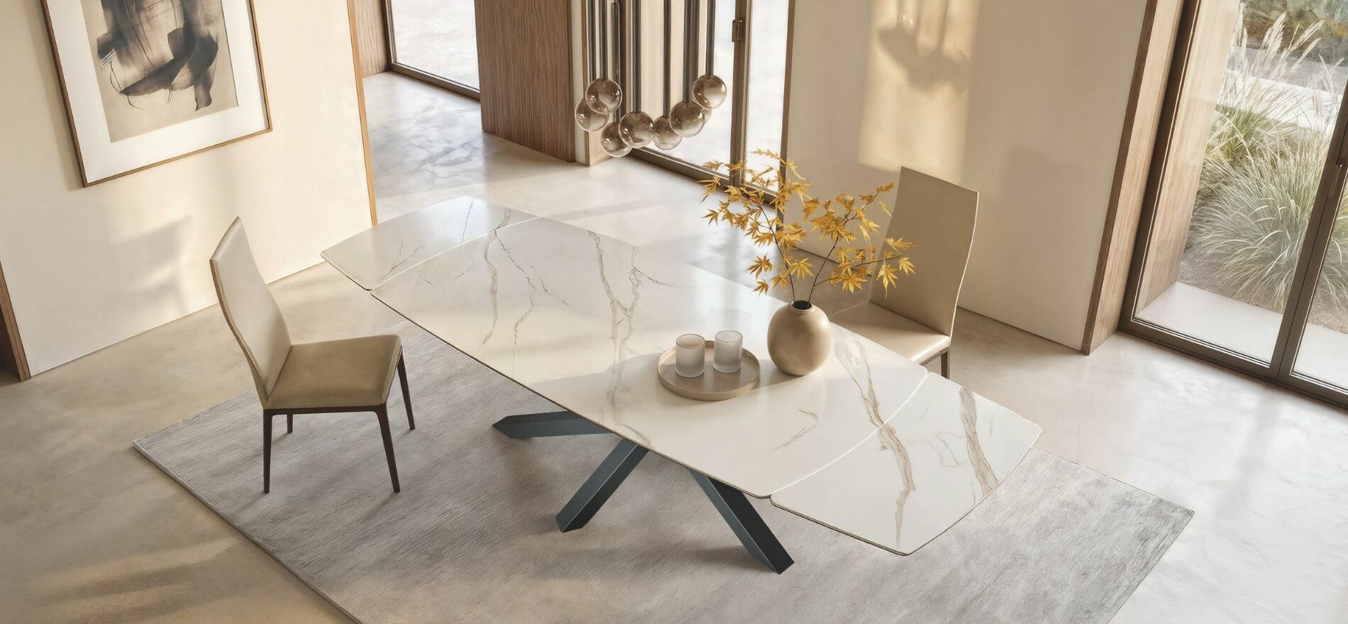 Tavolo di design allungabile con piano in ceramica